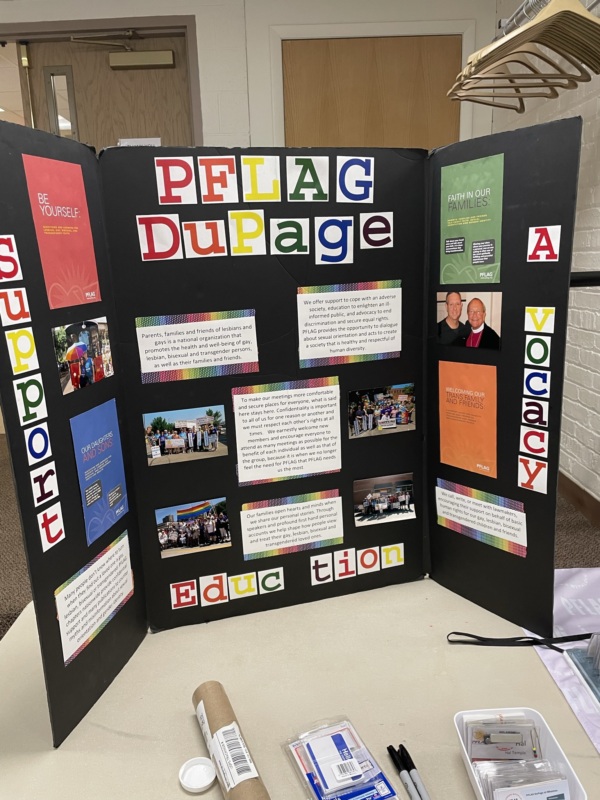 A foam core board with information about PFLAG DuPage
